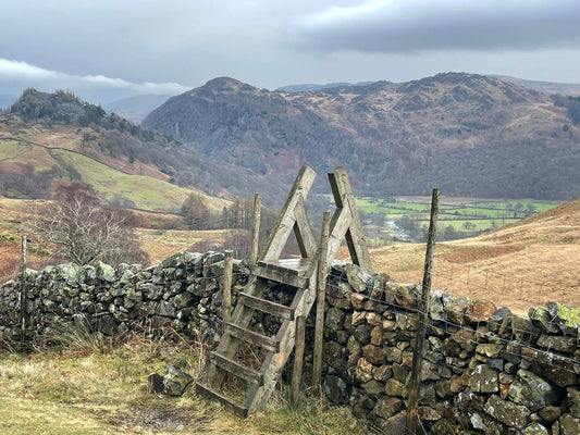 Stile over a wall in the Lake District in winter